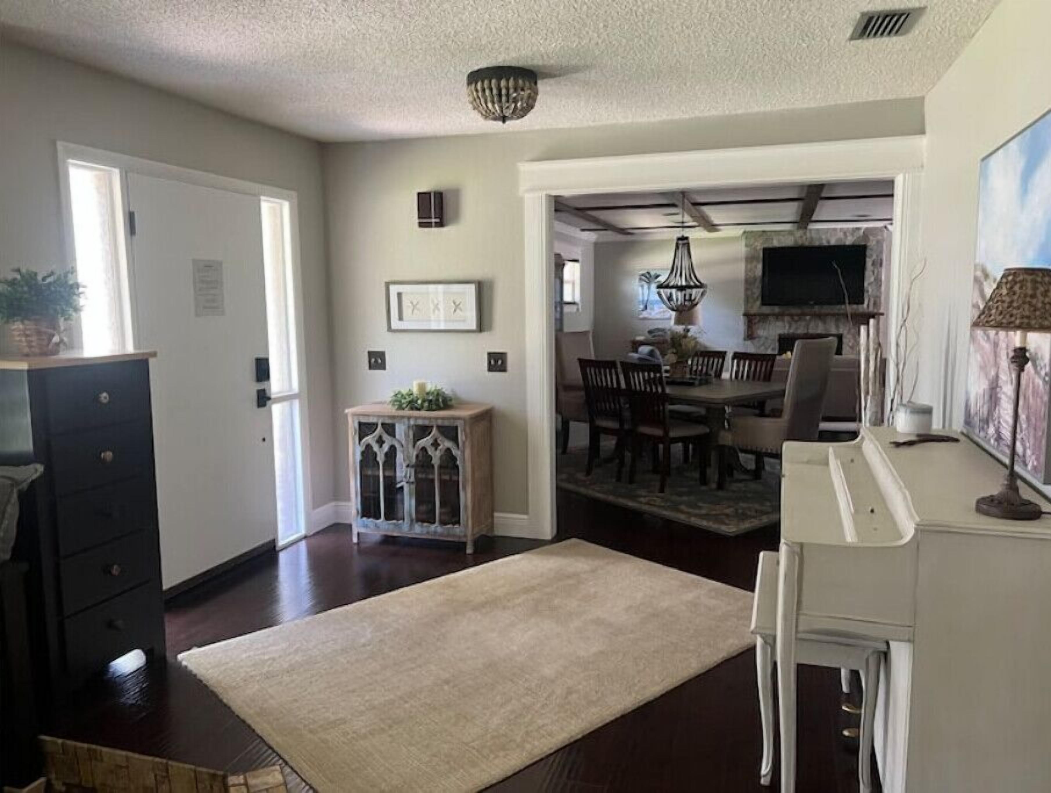 Charming home with pool, patio, and custom amenities in a peaceful neighborhood