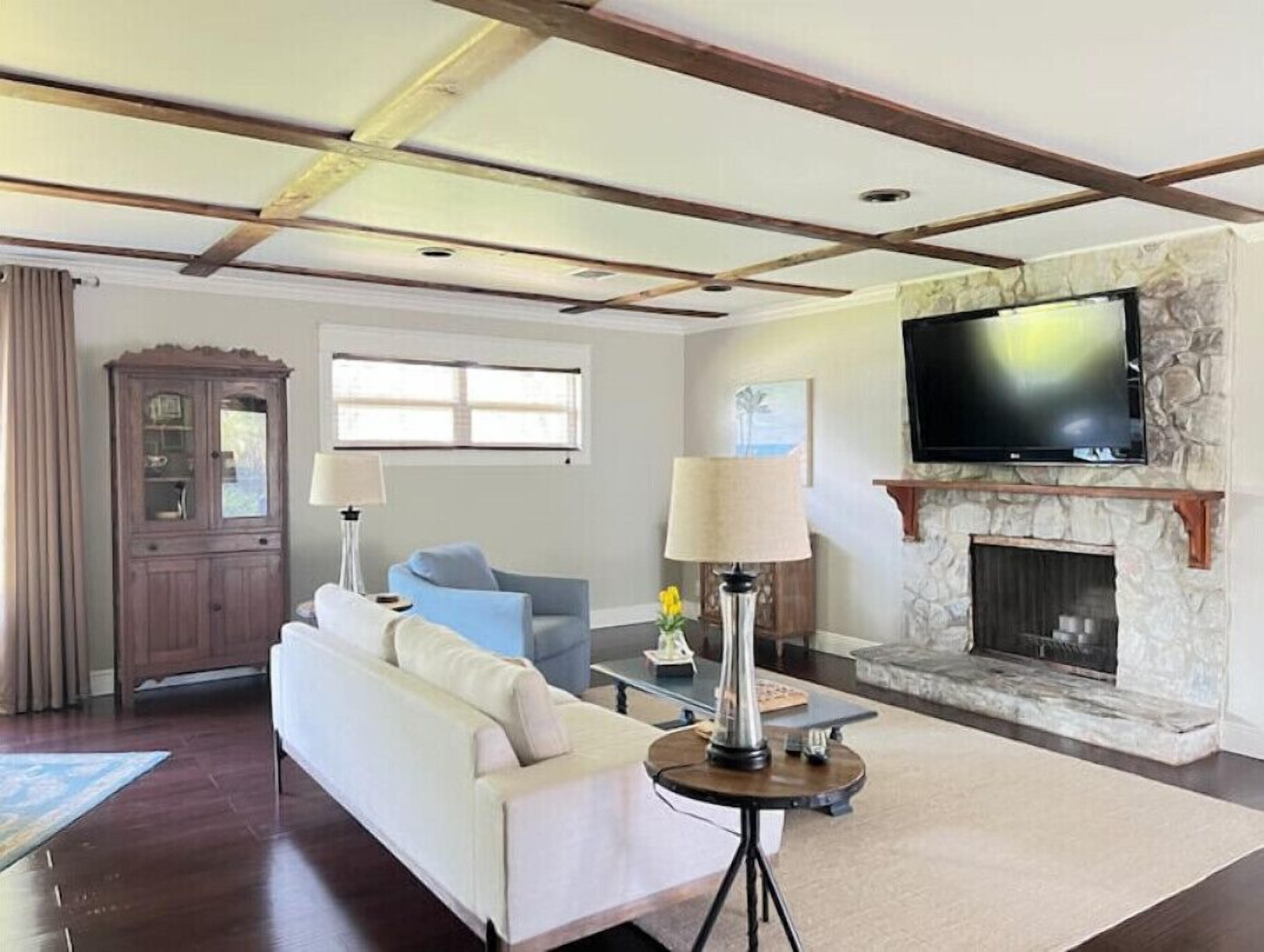 Charming home with pool, patio, and custom amenities in a peaceful neighborhood