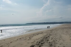 On the beach, white sand, beach umbrellas