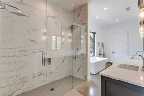 Shower, hair dryer, towels, soap