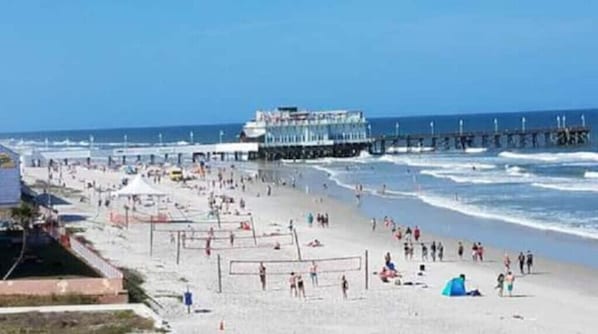 On the beach, sun loungers, beach towels