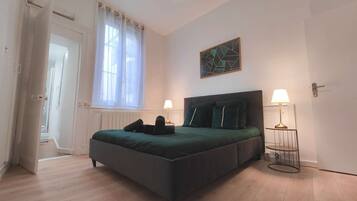 1 habitación, tabla de planchar con plancha, wifi y ropa de cama