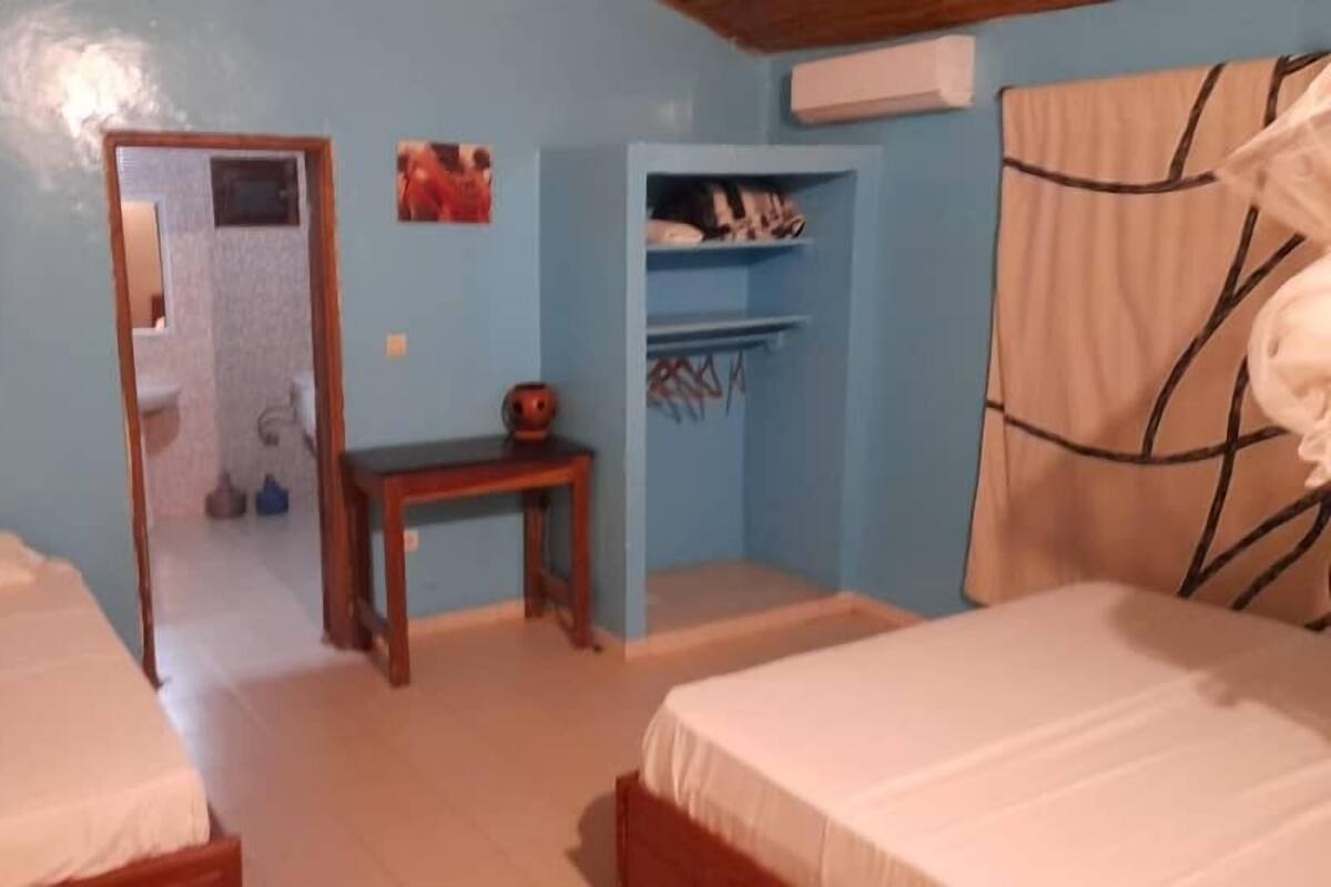 Deluxe Triple Room | Desk, iron/ironing board (on request), WiFi (free), bed sheets
