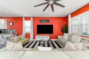 Téléviseur, jeux vidéo, table de baby-foot