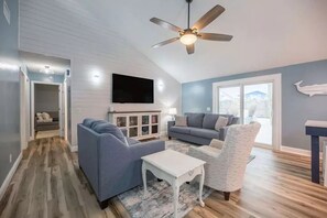 Smart TV, fireplace, books
