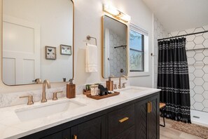 Combined shower/bathtub, hair dryer, towels, soap - Bus Stop Saloon | Unique Western Stay | Limited Dates Open (Cave Creek)