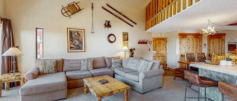 Televisión, chimenea, reproductor de DVD y videoteca