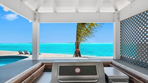 A barbecue grill with a view of a pool and ocean. - Ocean Front Property With Pool. - George Town (Exuma)