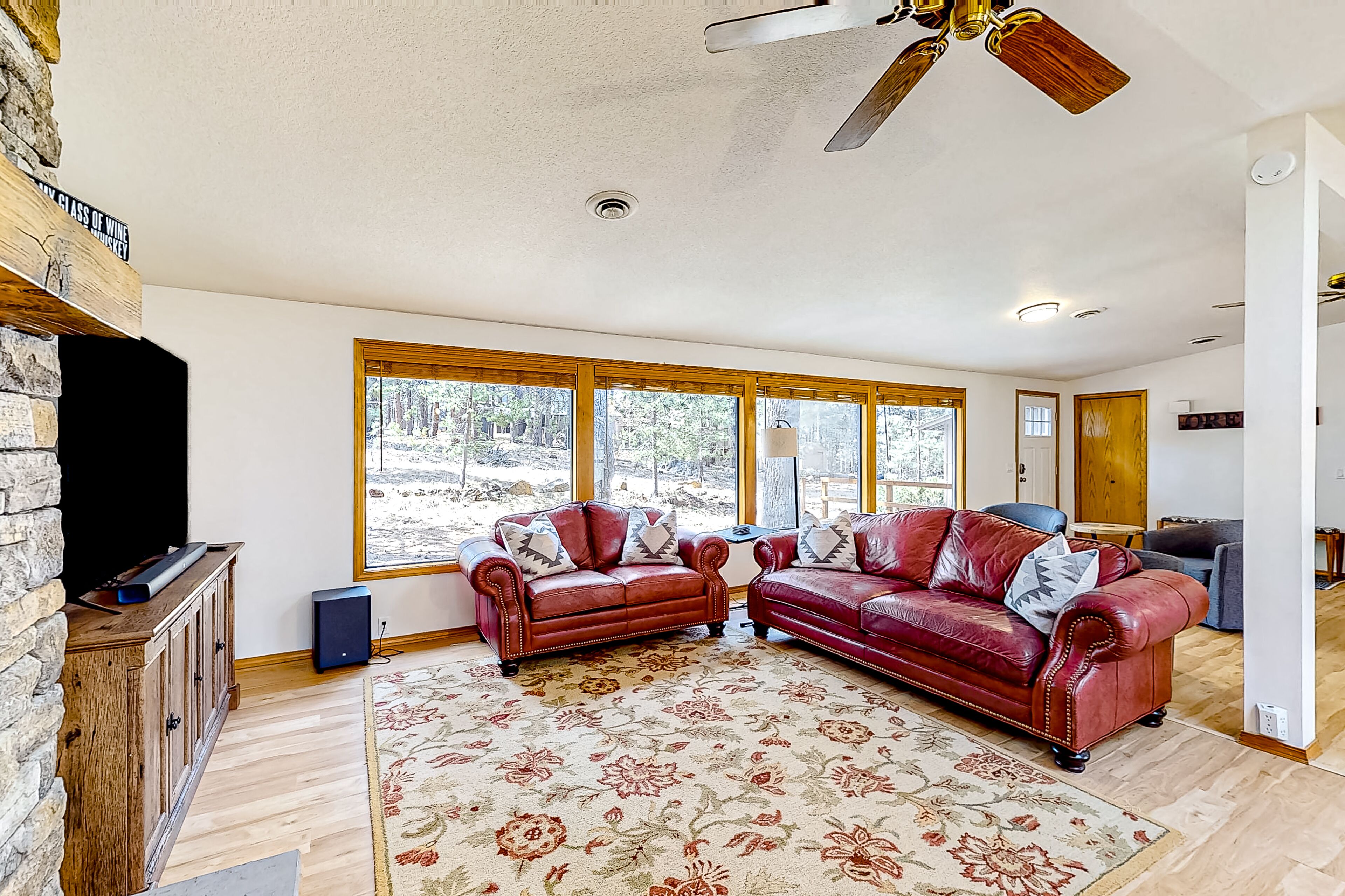 Charming, single-level retreat with a gas fireplace, AC, washer/dryer, & SHARC