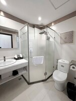 Hair dryer, bathrobes, slippers, towels