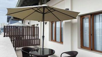 Suite with Balcony | 1 bedroom, in-room safe, individually furnished, desk