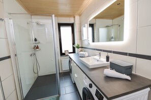 Hair dryer, towels, soap, shampoo