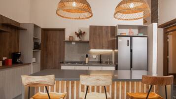 Fridge, microwave, stovetop, coffee/tea maker