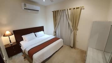 Apartemen Keluarga | 2 kamar tidur, tirai kedap cahaya, dan setrika/meja setrika