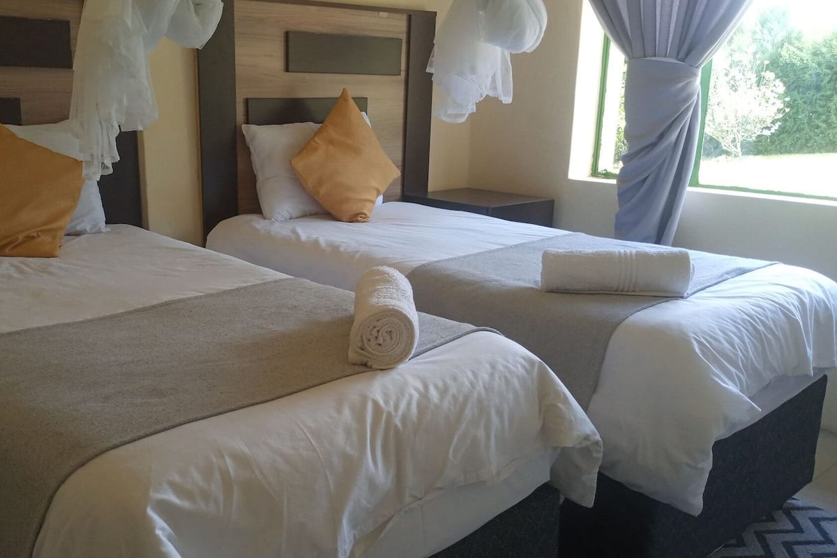 Comfort Twin kamer | Donzen dekbedden, Tempur Pedic-bedden, een laptopwerkplek, gratis wifi
