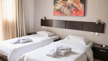 Basic Twin Room | In-room safe, blackout drapes, soundproofing, iron/ironing board