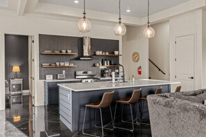 Fridge, microwave, oven, stovetop - "The Icarus” offers a blend of adventure & comfort, with the added luxury of a private courtyard! (Hurricane)