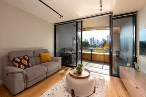 Basic Apartment, Multiple Beds | Living area