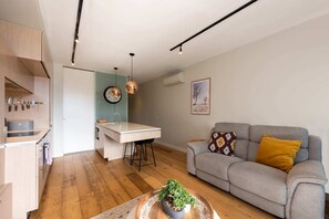 Basic Apartment, Multiple Beds | Living area