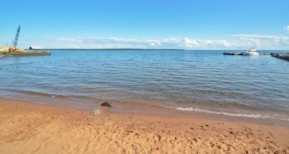 Chic and Modern Beach Front Condo with Lake Views