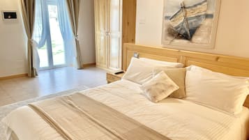 1 bedroom, desk, iron/ironing board, travel crib