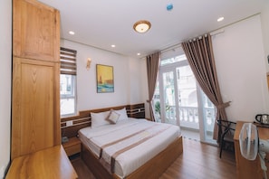 Habitación doble de lujo | Ropa de cama de alta calidad, edredón y camas Select Comfort 