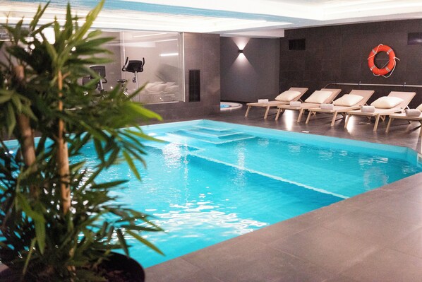 Indoor pool, open 9:00 AM to 9:00 PM, sun loungers