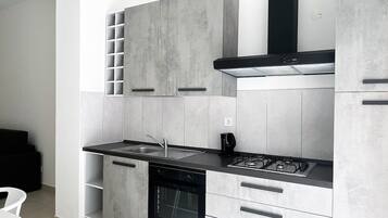 Standard Apartment | Private kitchen | Full-size fridge, microwave