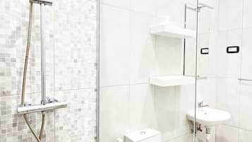Standard Apartment | Bathroom | Shower, rainfall showerhead, towels, toilet paper