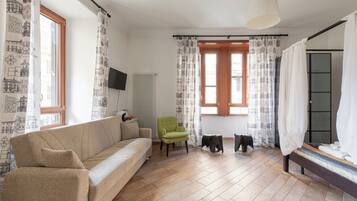 Habitación cuádruple Confort | Insonorización, wifi gratis y ropa de cama