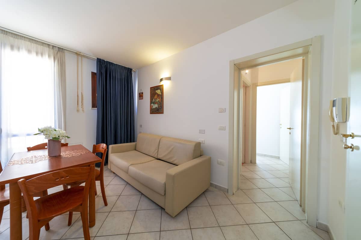 Superior Apartment, 1 Bedroom, Non Smoking, City View | Living area | 38-inch flat-screen TV with satellite channels, TV