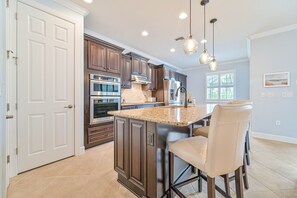 Fridge, microwave, oven, stovetop - ***Pool Home with lake view at The Preserve at Estero*** (Estero)