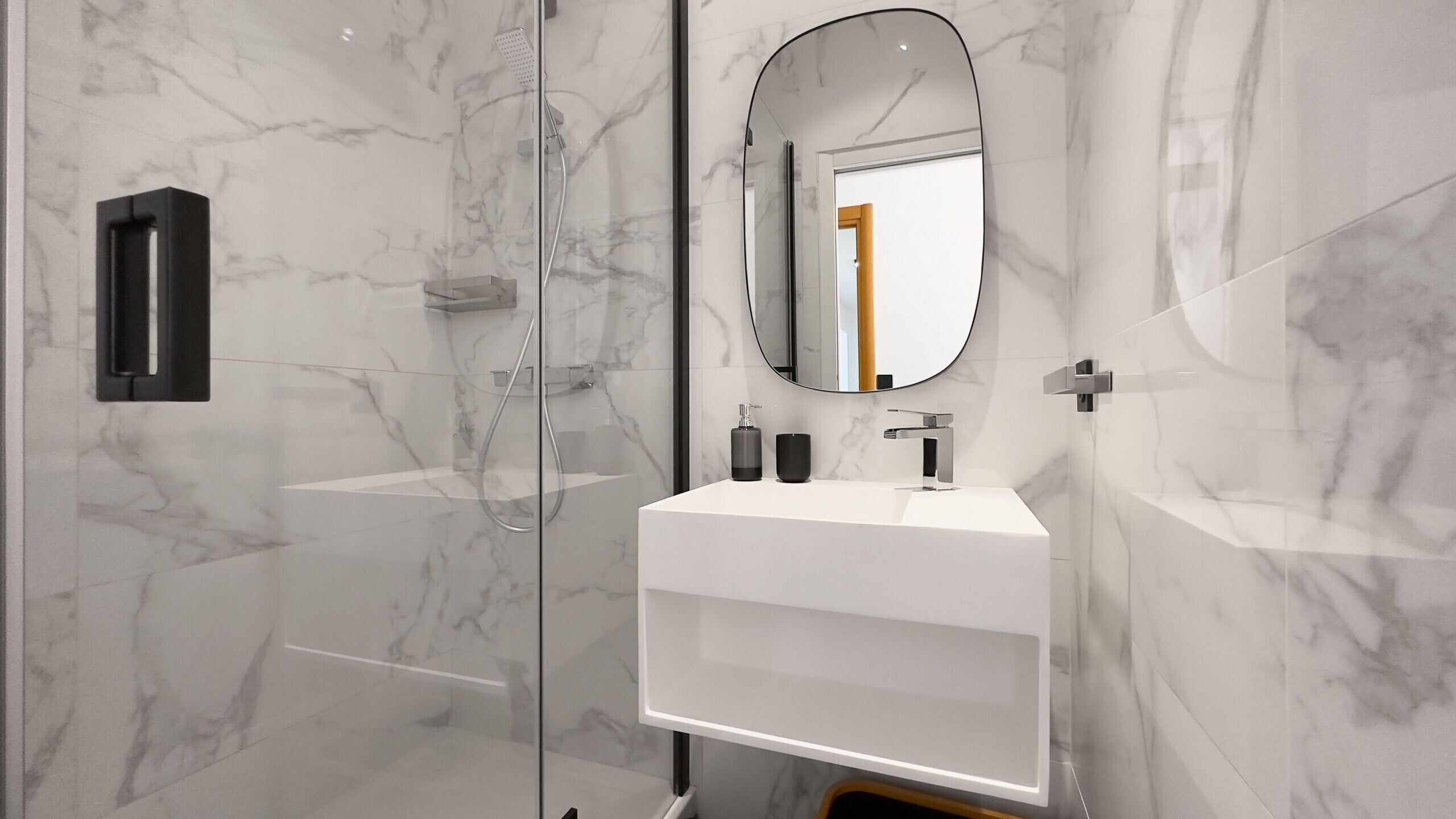 Shower, hair dryer, towels, shampoo