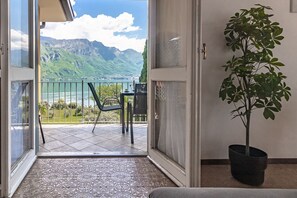 Apartment | Living area | 35-inch flat-screen TV with digital channels, TV - Ca' Maria Acero by Wonderful Italy  (Bellagio)