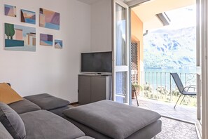 Apartment | Living area | 35-inch flat-screen TV with digital channels, TV - Ca' Maria Acero by Wonderful Italy  (Bellagio)