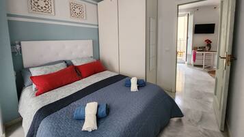 1 bedroom, desk, iron/ironing board, travel cot