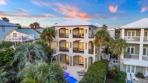 A multi-story hotel with balconies, a swimming pool, and lush landscaping. - Gulf Views | Pool | Close to Beach | Elevator (Santa Rosa Beach)