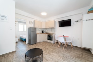 Apartment, 1 Bedroom | Living area | 40-inch Smart TV with cable channels, TV - Aphrodite Residential Complex (Pangaio)