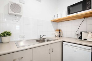 Fridge, microwave, coffee/tea maker, electric kettle