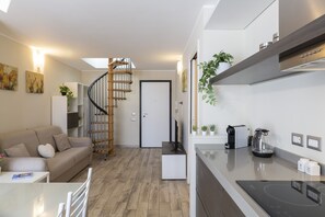 Comfort Apartment | Living area | 43-inch flat-screen TV with digital channels, TV