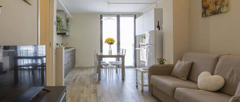 Comfort Apartment | Living area | 43-inch flat-screen TV with digital channels, TV