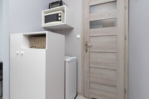 Appartamento, 1 camera da letto, cucina, fronte mare | Bagno | Doccia, asciugamani