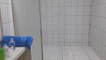 Shower, rainfall showerhead, designer toiletries, slippers