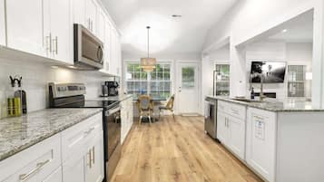 Coffee/tea maker, fridge, microwave, oven