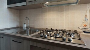 Ảnh chưa phân loại, 4 trong số 18 ảnh, nút