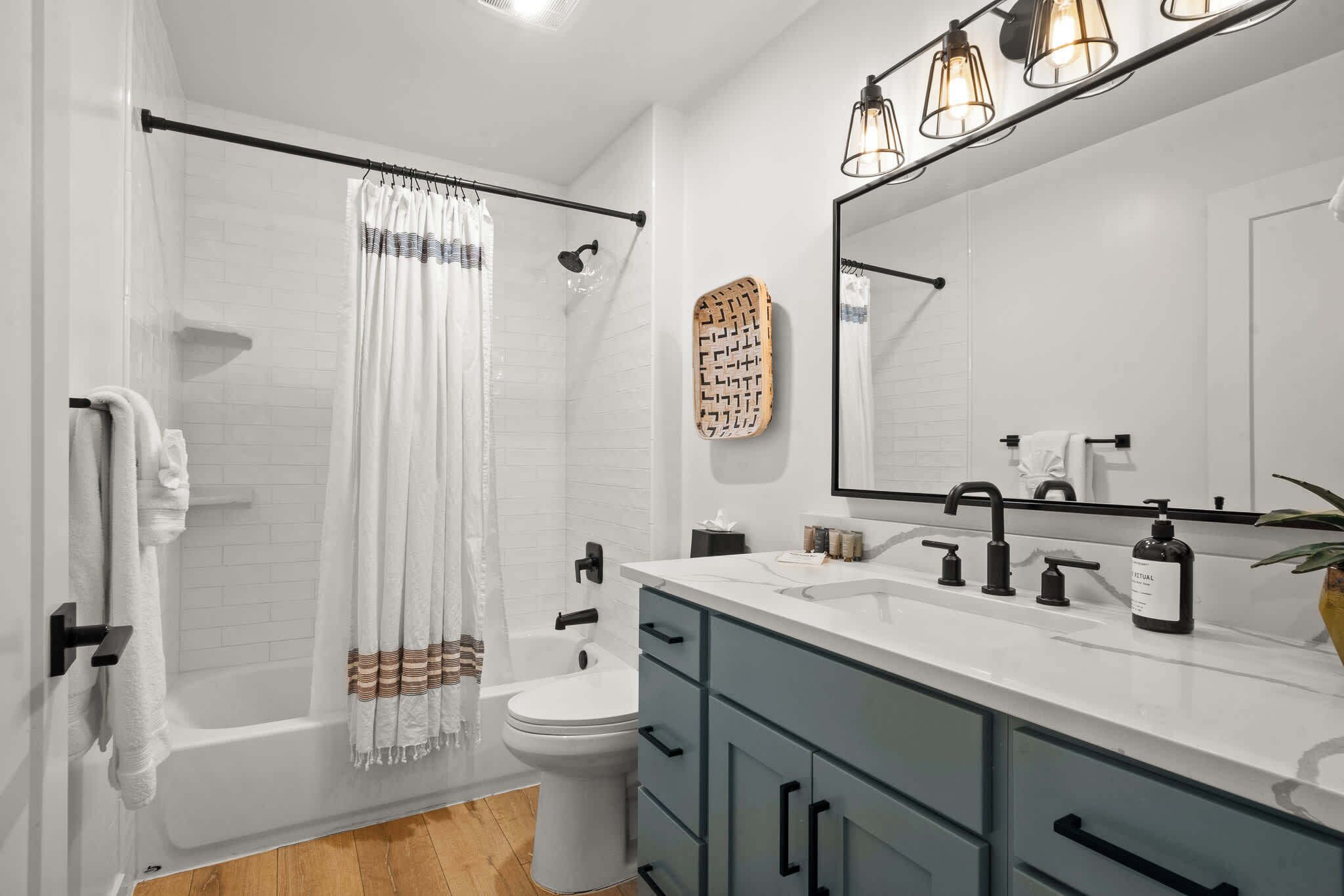 Bathtub, hair dryer, towels