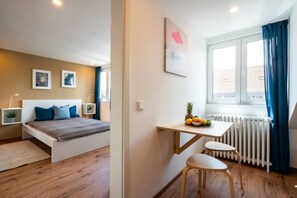 1 bedroom, desk, iron/ironing board, travel cot