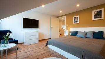 1 bedroom, desk, iron/ironing board, travel crib