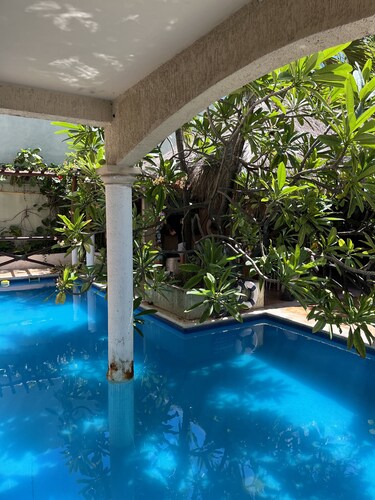 Spend the day at the Soggy Peso Palapa Bar, and spend the night in The Penthouse