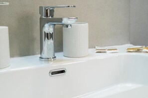 Hair dryer, towels, soap, shampoo